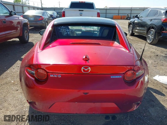 2020 Mazda MX-5 Miata Grand Touring z VIN JM1NDAM77L0418499, wystawiony jako IAAI lot #42010802 z przebiegiem 19 588 mil mil oraz . Historia ofert i sprzedaży dostępna na DreamBid. Obrazek 16.