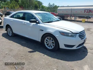 2015 Ford Taurus SE z VIN 1FAHP2D81FG105131, wystawiony jako IAAI lot #42148853 z przebiegiem 197 695 mil mil oraz . Historia ofert i sprzedaży dostępna na DreamBid. Obrazek 1.