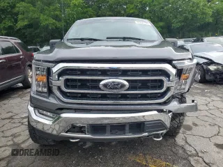 2021 Ford F-150 XL with VIN 1FTEW1EP0MFB98114, listed as a Copart auction lot 55892705 with 47,619 mi miles and Salvage title. Bid and sale history available at DreamBid. Image 5.