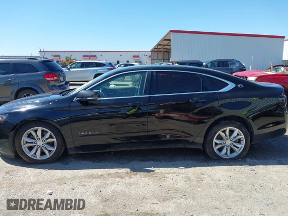 2017 Chevrolet Impala LT with VIN 1G1105S39HU189768, listed as a IAAI auction lot 41762234 with 165,927 mi miles and . Bid and sale history available at DreamBid. Image 14.
