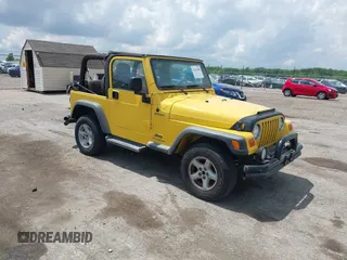 2004 Jeep Wrangler Sport z VIN 1J4FA49S04P701986, wystawiony jako IAAI lot #42256648 z przebiegiem 129 946 mil mil oraz . Historia ofert i sprzedaży dostępna na DreamBid. Obrazek 1.