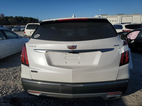2024 Cadillac XT5 FWD Premium Luxury with VIN 1GYKNCRS7RZ740471, listed as a Copart auction lot 82275174 with 14,747 mi miles and Salvage Title. Bid and sale history available at carsss.com. Image 6.