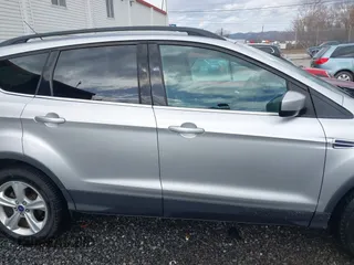 2014 Ford Escape SE with VIN 1FMCU9GX3EUD05447, listed as a IAAI auction lot 41817513 with 155,101 mi miles. Bid and sale history available at carsss.com. Image 13.