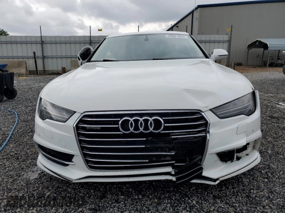 2016 Audi A7 Premium Plus с VIN WAUWGAFC6GN072330, выставлен на аукционе Copart как лот 53941805 с пробегом 169 237 миль миль и Списание • Salvage title. История ставок и продаж доступна на DreamBid. Изображение 5.