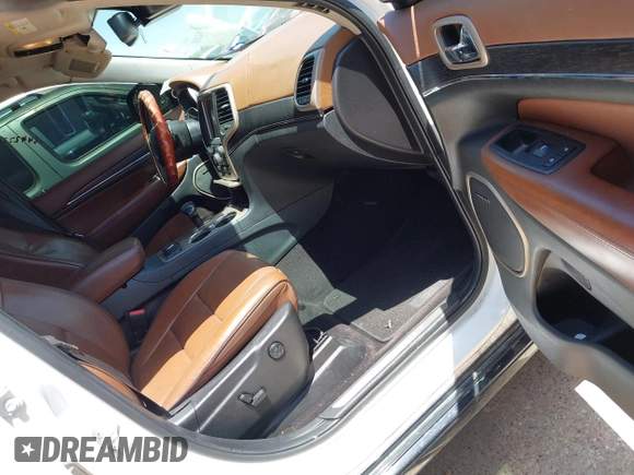 2015 Jeep Grand Cherokee Summit с VIN 1C4RJFJTXFC173287, выставлен на аукционе IAAI как лот 42794100 с пробегом 125 705 миль миль и . История ставок и продаж доступна на DreamBid. Изображение 5.