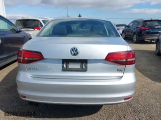2016 Volkswagen Jetta Sedan 1.4T S with VIN 3VW267AJ1GM267966, listed as a IAAI auction lot 41847022 with 140,634 mi miles. Bid and sale history available at carsss.com. Image 16.