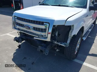 2014 Ford F-150 XL with VIN 1FTFW1CT0EKF76199, listed as a IAAI auction lot 42408498 with 103,695 mi miles and . Bid and sale history available at DreamBid. Image 6.