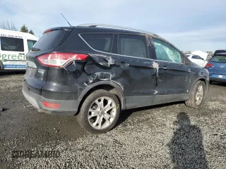 2016 Ford Escape Titanium with VIN 1FMCU0J9XGUA30359, listed as a Copart auction lot 89178985 with 148,718 mi miles and Salvage Title. Bid and sale history available at carsss.com. Image 3.