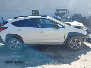 2024 Subaru Crosstrek Premium z VIN JF2GUADC0R8873664, wystawiony jako IAAI lot #42395857 z przebiegiem 11 924 mil mil oraz . Historia ofert i sprzedaży dostępna na DreamBid. Obrazek 13.