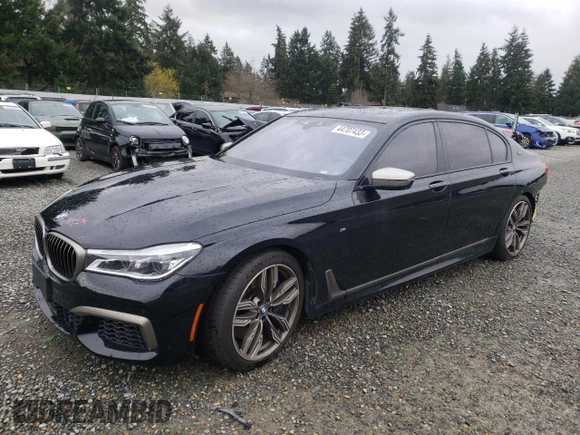 2018 BMW 7 Series M760i xDrive with VIN WBA7H6C55JG614811, listed as a Copart auction lot 44707433 with 27,542 mi miles. Bid and sale history available at carsss.com. Image 1.