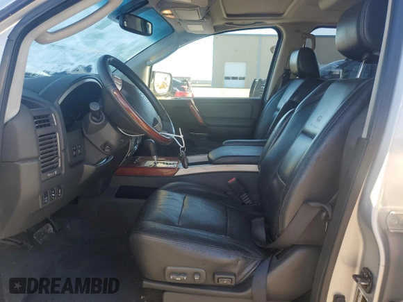 2006 Infiniti QX56 z VIN 5N3AA08A16N804708, wystawiony jako Copart lot #86788354 z przebiegiem 205 417 mil mil oraz Czysty tytuł • Clean title. Historia ofert i sprzedaży dostępna na DreamBid. Obrazek 7.