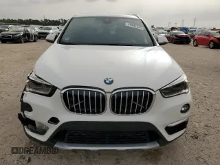 2019 BMW X1 sDrive28i with VIN WBXHU7C57K3H44192, listed as a Copart auction lot 49882335 with 79,350 mi miles and Salvage Title. Bid and sale history available at carsss.com. Image 5.