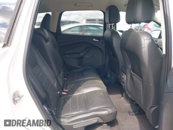 2015 Ford Escape Titanium with VIN 1FMCU0J91FUB13810, listed as a IAAI auction lot 41961798 with 139,265 mi miles. Bid and sale history available at carsss.com. Image 8.
