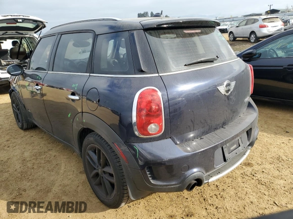 2011 MINI Countryman S with VIN WMWZC5C53BWH99985, listed as a Copart auction lot 89191125 with 90,177 mi miles and Salvage Title. Bid and sale history available at DreamBid. Image 2.