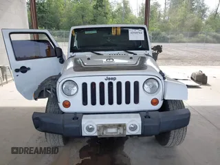 2012 Jeep Wrangler Unlimited Sahara with VIN 1C4BJWEG7CL275883, listed as a IAAI auction lot 42510764 with 149,531 mi miles and . Bid and sale history available at DreamBid. Image 13.