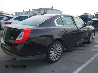 2013 Lincoln MKS with VIN 1LNHL9DK6DG608673, listed as a IAAI auction lot 42756289 with 103,118 mi miles and . Bid and sale history available at DreamBid. Image 4.