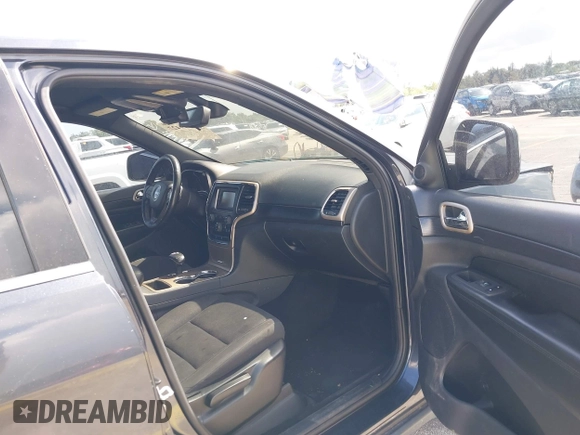 2014 Jeep Grand Cherokee Laredo with VIN 1C4RJEAG0EC179563, listed as a IAAI auction lot 39799427 with 209,169 mi miles and . Bid and sale history available at DreamBid. Image 5.