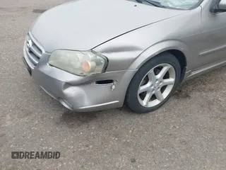 2003 Nissan Maxima SE with VIN JN1DA31DX3T521797, listed as a IAAI auction lot 42737605 with 150,045 mi miles and . Bid and sale history available at DreamBid. Image 6.