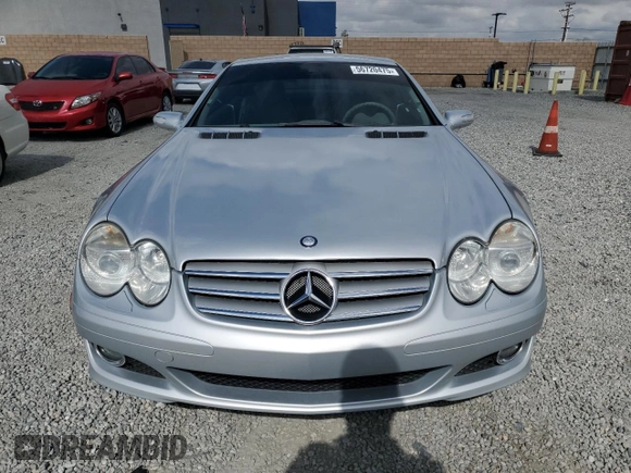 2007 Mercedes-Benz SL 550 z VIN WDBSK71F67F124729, wystawiony jako Copart lot #56720475 z przebiegiem 96 635 mil mil oraz Szkoda całkowita • Salvage title. Historia ofert i sprzedaży dostępna na DreamBid. Obrazek 5.