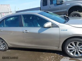 2015 Toyota Camry Hybrid LE with VIN 4T1BD1FK1FU174975, listed as a IAAI auction lot 42085034 with 54,728 mi miles. Bid and sale history available at carsss.com. Image 14.