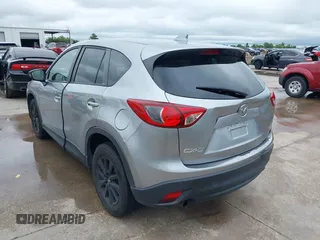 2014 Mazda CX-5 Touring z VIN JM3KE2CY8E0369145, wystawiony jako IAAI lot #42462985 z przebiegiem 155 480 mil mil oraz . Historia ofert i sprzedaży dostępna na DreamBid. Obrazek 3.