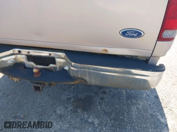1998 Ford F-150 z VIN 1FTDX1764WNA01757, wystawiony jako IAAI lot #42149319 z przebiegiem 133 278 mil mil oraz . Historia ofert i sprzedaży dostępna na DreamBid. Obrazek 13.
