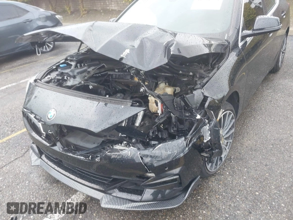 2021 BMW 2 Series 228i with VIN WBA53AK02M7H50951, listed as a IAAI auction lot 41791778 with 30,809 mi miles and . Bid and sale history available at DreamBid. Image 6.
