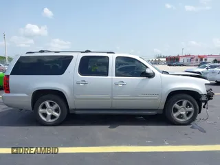 2013 Chevrolet Suburban LT with VIN 1GNSCJE08DR378459, listed as a IAAI auction lot 42453650 with 179,156 mi miles and . Bid and sale history available at DreamBid. Image 14.