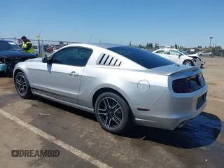 2013 Ford Mustang V6 with VIN 1ZVBP8AM4D5212653, listed as a IAAI auction lot 42090402 with 134,437 mi miles. Bid and sale history available at carsss.com. Image 3.