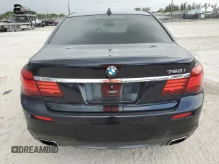 2013 BMW 7 Series 750i with VIN WBAYA8C56DC996704, listed as a Copart auction lot 64466705 with 102,278 mi miles and Salvage title. Bid and sale history available at DreamBid. Image 6.