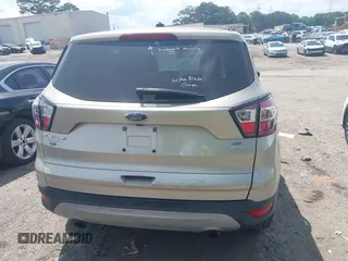 2017 Ford Escape SE with VIN 1FMCU0GD4HUE85348, listed as a IAAI auction lot 42135485 with 124,608 mi miles. Bid and sale history available at carsss.com. Image 16.