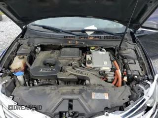 2016 Lincoln MKZ Hybrid z VIN 3LN6L2LU9GR606432, wystawiony jako Copart lot #58596655 z przebiegiem 113 478 mil mil oraz Szkoda całkowita • Salvage title. Historia ofert i sprzedaży dostępna na DreamBid. Obrazek 11.