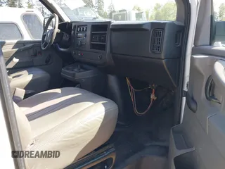 2012 Chevrolet Express Cargo Van with VIN 1GCWGFCB0C1117727, listed as a IAAI auction lot 42105038 with 204,472 mi miles. Bid and sale history available at carsss.com. Image 5.