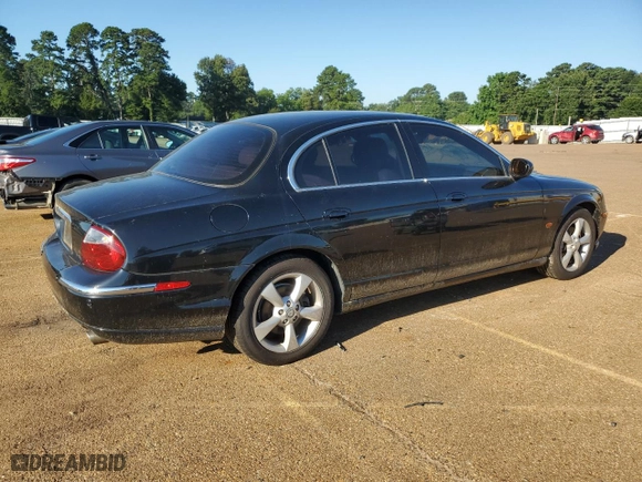 2004 Jaguar S-Type with VIN SAJEA01T04FN08520, listed as a Copart auction lot 58475964 with 67,744 mi miles and Salvage Title. Bid and sale history available at carsss.com. Image 3.