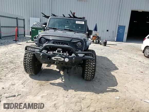 2016 Jeep Wrangler Unlimited Rubicon with VIN 1C4BJWFG8GL192077, listed as a Copart auction lot 58339005 with 62,076 mi miles and Salvage title. Bid and sale history available at DreamBid. Image 15.