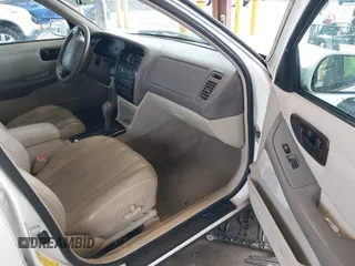 1998 Toyota Avalon XL with VIN 4T1BF18B5WU242038, listed as a IAAI auction lot 41577342 with 195,707 mi miles and . Bid and sale history available at DreamBid. Image 5.