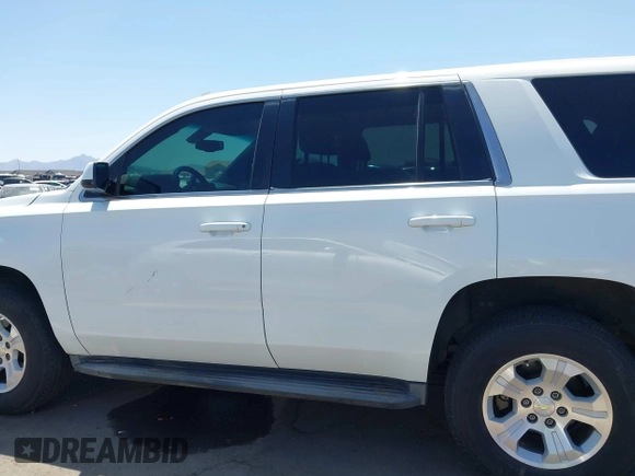 2015 Chevrolet Tahoe Commercial with VIN 1GNSK3EC9FR622941, listed as a IAAI auction lot 42592315 with 239,334 mi miles and . Bid and sale history available at DreamBid. Image 15.