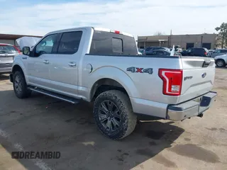 2015 Ford F-150 XLT with VIN 1FTEW1EG3FKD37310, listed as a IAAI auction lot 41681029 with 145,069 mi miles. Bid and sale history available at carsss.com. Image 3.