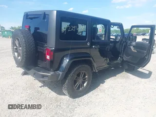 2016 Jeep Wrangler Unlimited Sahara with VIN 1C4BJWEG8GL253803, listed as a IAAI auction lot 42296118 with 163,463 mi miles and . Bid and sale history available at DreamBid. Image 4.