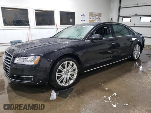 2015 Audi A8 4.0T z VIN WAU32AFD0FN017865, wystawiony jako Copart lot #37065594 z przebiegiem 55 632 mil mil oraz Szkoda całkowita • Salvage title. Historia ofert i sprzedaży dostępna na DreamBid. Obrazek 1.
