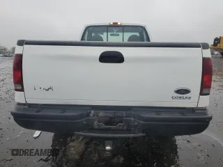 1999 Ford Super Duty F-250 XL with VIN 1FTNF20L0XEA51389, listed as a Copart auction lot 52618635 with 198,767 mi miles and Salvage Title. Bid and sale history available at carsss.com. Image 6.