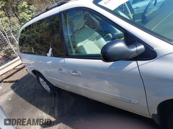 2006 Chrysler Town & Country Touring with VIN 2A8GP54L56R671585, listed as a IAAI auction lot 41475419 with 166,861 mi miles and . Bid and sale history available at DreamBid. Image 13.