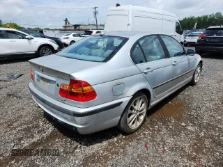 2004 BMW 3 Series 330xi with VIN WBAEW53464PG10935, listed as a Copart auction lot 63155905 with 165,240 mi miles and Clean title. Bid and sale history available at DreamBid. Image 3.