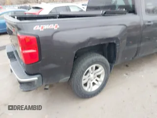 2014 Chevrolet Silverado 1500 LT with VIN 1GCVKREC8EZ325070, listed as a IAAI auction lot 41328199 with 164,009 mi miles and . Bid and sale history available at DreamBid. Image 6.
