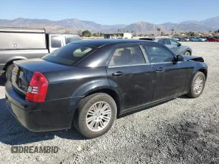2009 Chrysler 300 LX with VIN 2C3KA43D59H529761, listed as a Copart auction lot 44260275 with 135,802 mi miles and Salvage Title. Bid and sale history available at carsss.com. Image 3.