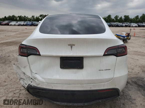 2021 Tesla Model Y Long Range z VIN 5YJYGDEE0MF299944, wystawiony jako Copart lot #55424295 z przebiegiem 54 698 mil mil oraz Szkoda całkowita • Salvage title. Historia ofert i sprzedaży dostępna na DreamBid. Obrazek 6.