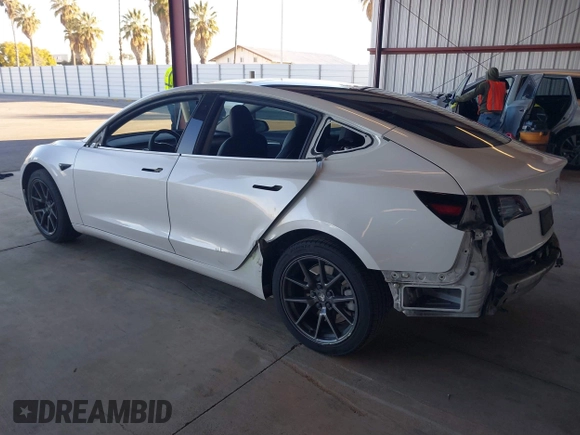 2021 Tesla Model 3 Long Range with VIN 5YJ3E1EB3MF003027, listed as a IAAI auction lot 41859036 with 102,302 mi miles and . Bid and sale history available at carsss.com. Image 3.