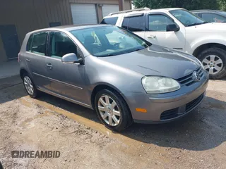 2007 Volkswagen Rabbit z VIN WVWDR71K87W278085, wystawiony jako IAAI lot #42409053 z przebiegiem 165 454 mil mil oraz . Historia ofert i sprzedaży dostępna na DreamBid. Obrazek 1.