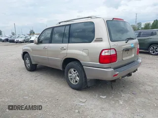 1999 Lexus LX 470 with VIN JT6HT00W6X0041264, listed as a IAAI auction lot 42177546 with 272,000 mi miles and . Bid and sale history available at DreamBid. Image 3.
