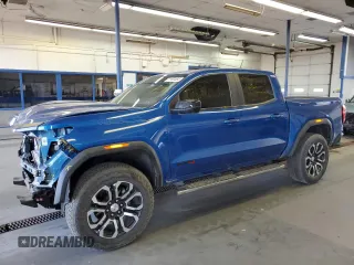 2024 GMC Canyon 4WD AT4 with VIN 1GTP6DEK3R1114273, listed as a Copart auction lot 71103464 with 5,549 mi miles and Salvage Title. Bid and sale history available at carsss.com. Image 1.